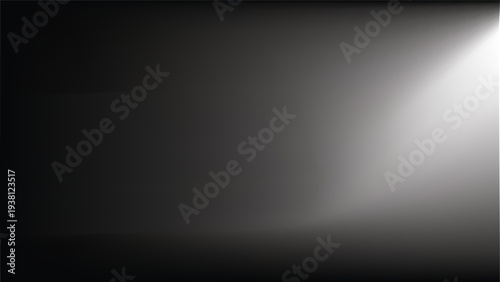 Black matte textured background with floating dust particles illuminated by soft light in the top right corner, creating a deep contrast between black and white. This abstract design emphasizes textur