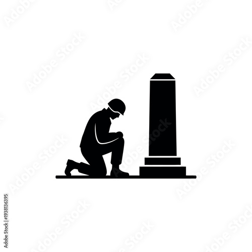Soldier Kneeling at Memorial Silhouette.