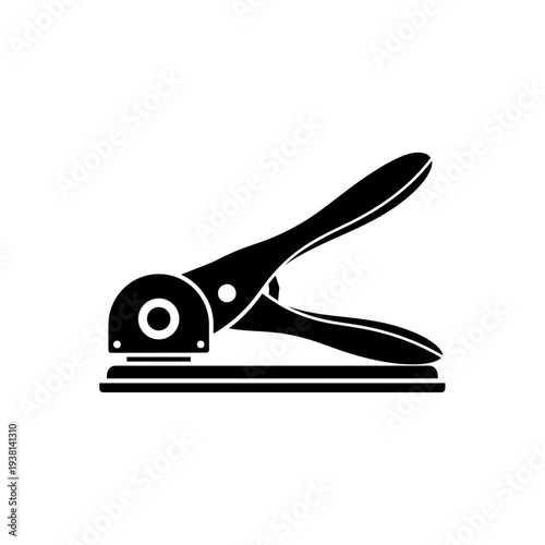 Black silhouette of a paper craft punch tool isolated on a white background, showcasing its ergonomic design and functionality in a minimalist style