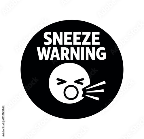 A simple black round warning icon showing a sneezing face and spray lines with the text "sneeze warning" — useful for health and hygiene signs, workplace alerts, and public safety notices.