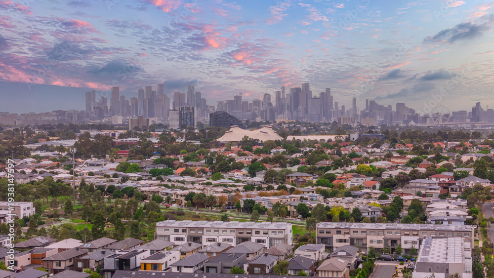 Fototapeta premium Panoramic Aerial Drone view of Inner Suburbs of Melbourne housing, roof tops, the streets and the parks, the roads and trees of Ascot Vale Moonee Ponds Brunswick Essendon and Maribyrnong in VIC Victor