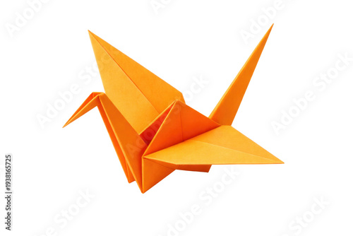 Foto traditional orange origami crane, symbol of peace and good fortune, isolated on a black studio background