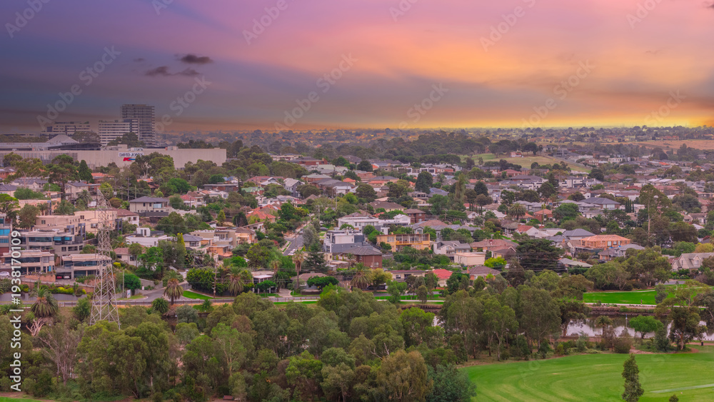 Fototapeta premium Panoramic Aerial Drone view of Inner Suburbs of Melbourne housing, roof tops, the streets and the parks, the roads and trees of Ascot Vale Moonee Ponds Brunswick Essendon and Maribyrnong in VIC Victor