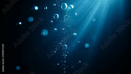 Air bubbles rising through dark blue deep sea water in a cinematic 3D animation, capturing a peaceful underwater atmosphere for abstract backgrounds.