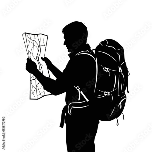 A silhouette of a man with a backpack studying a map