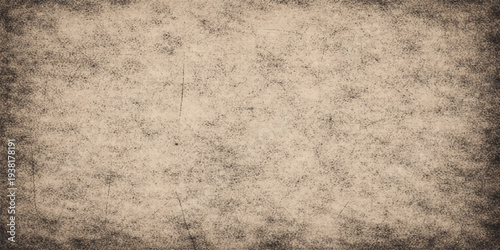 Aged vintage parchment background featuring a stained brown grunge paper texture with a rough antique pattern and blank retro design for a grungy ancient page backdrop