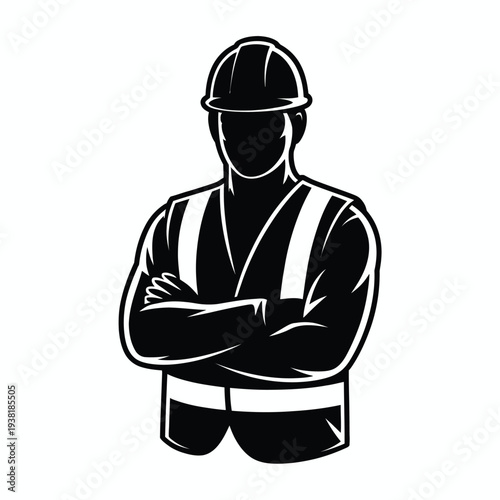 Construction worker in hard hat and safety vest with arms crossed standing confidently on site