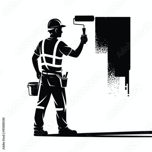 Worker painting wall with black paint and roller in hand standing in front of white background