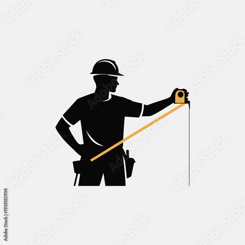 Construction worker measuring distance with tape measure on site