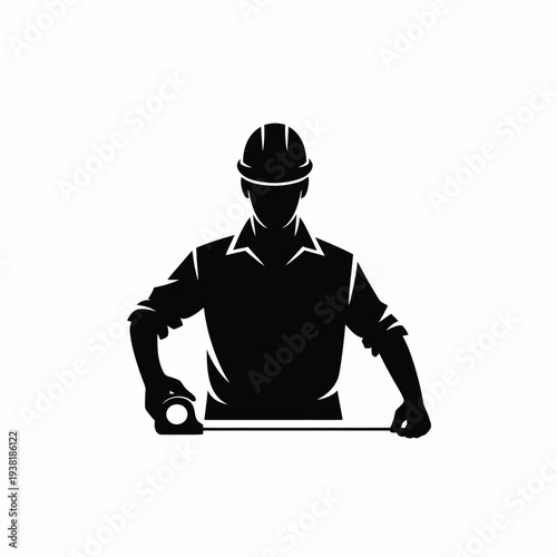 Construction worker with a tape measure in a hard hat and uniform standing ready for a building project