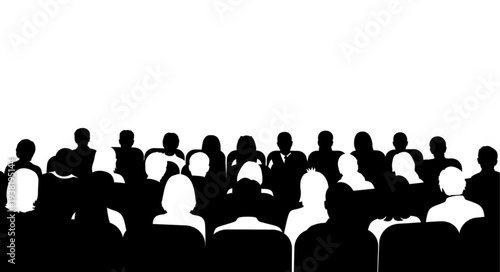 Silhouetted Audience Watching Presentation Together.