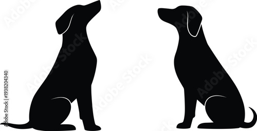 Two black dog silhouettes sitting facing each other on a white background Keywords: dog, silhouette, sitting, animal, canine