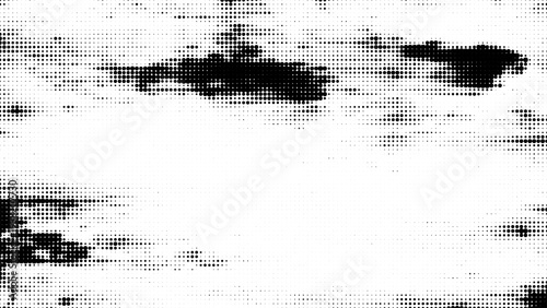Halftone heart shape formed by black dots on white background