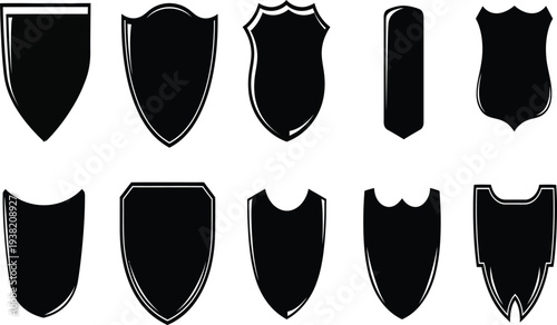 Set of ten black heraldic shield silhouettes with various classic shapes and white outlines for security logos insignia and coat of arms