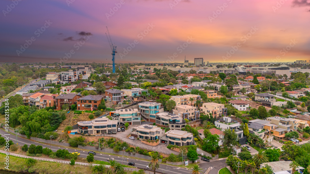 Obraz premium Panoramic Aerial Drone view of Inner Suburbs of Melbourne housing, roof tops, the streets and the parks, the roads and trees of Ascot Vale Moonee Ponds Brunswick Essendon and Maribyrnong in VIC Victor
