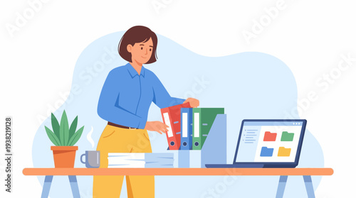 Woman organizing files and documents on her desk with laptop.