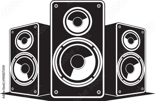 Three black speaker cabinets arranged together on stage for concert isolated