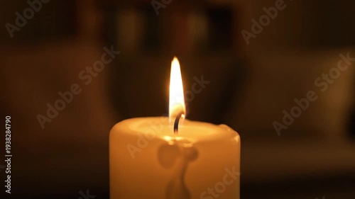 Candle Flame Burning in Dark Room.