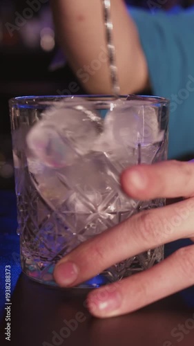Bartender makes cocktails in bar
