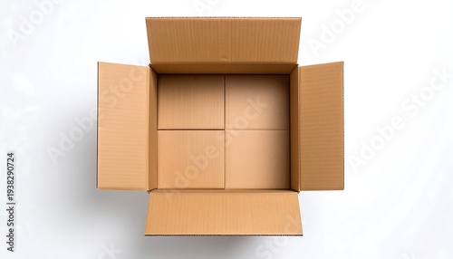 Top-down shot of a half-closed corrugated cardboard box on a white surface, showing internal folding flaps