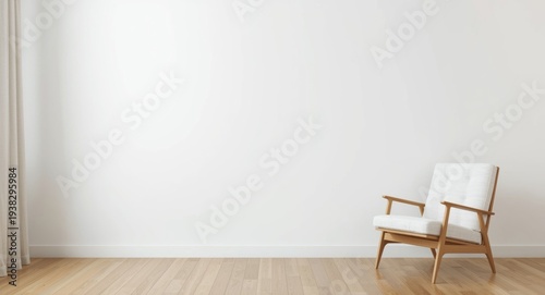 Minimalist apartment layout with armchair adjacent to unembellished white wall