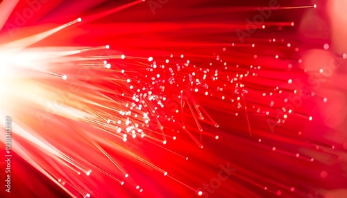 Blurry vibrant red strands emanate from a bright white point, suggesting light and movement in this abstract composition