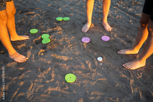 People playing tejo traditional beach game in argentina