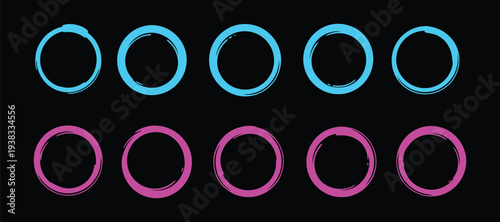 Neon circles in blue and pink on black background