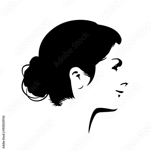 Young woman face side view in low key style. Elegant silhouette of a female head. Positive emotions.
