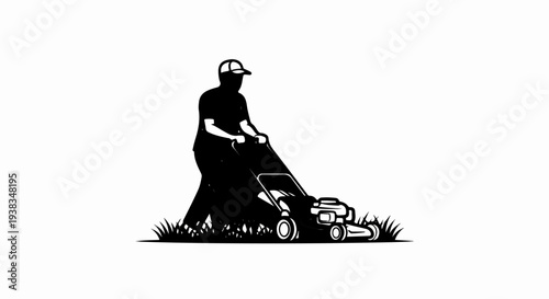 Silhouette of a person pushing a lawnmower through grass