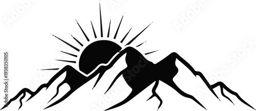 Silhouette of jagged mountains under a rising, rayed sun