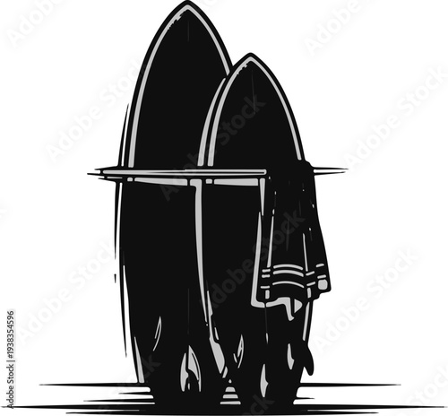 Two surfboards stand on a rack with a towel draped over one