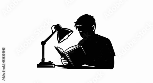 Silhouette of person reading a book under a desk lamp