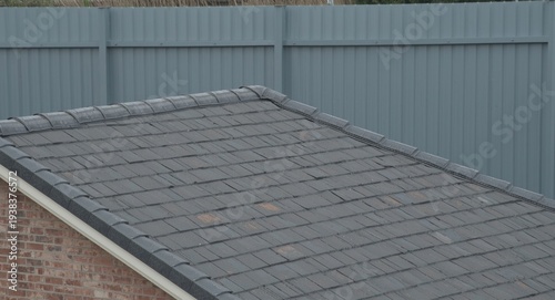 Brick residence rooftop ado...