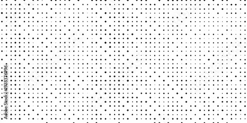 Dense pattern of small black diamond shapes on a white background