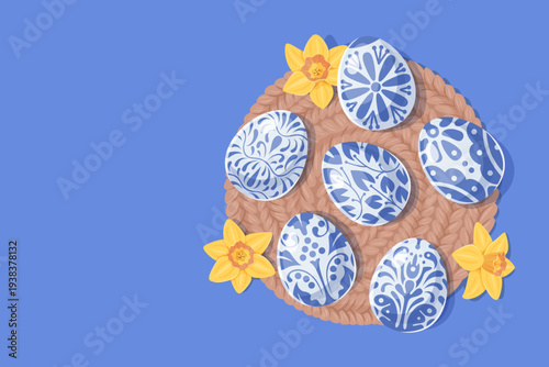 Blue Easter eggs on woven placemat