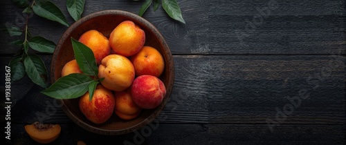 Bowl containing ripe aprico...