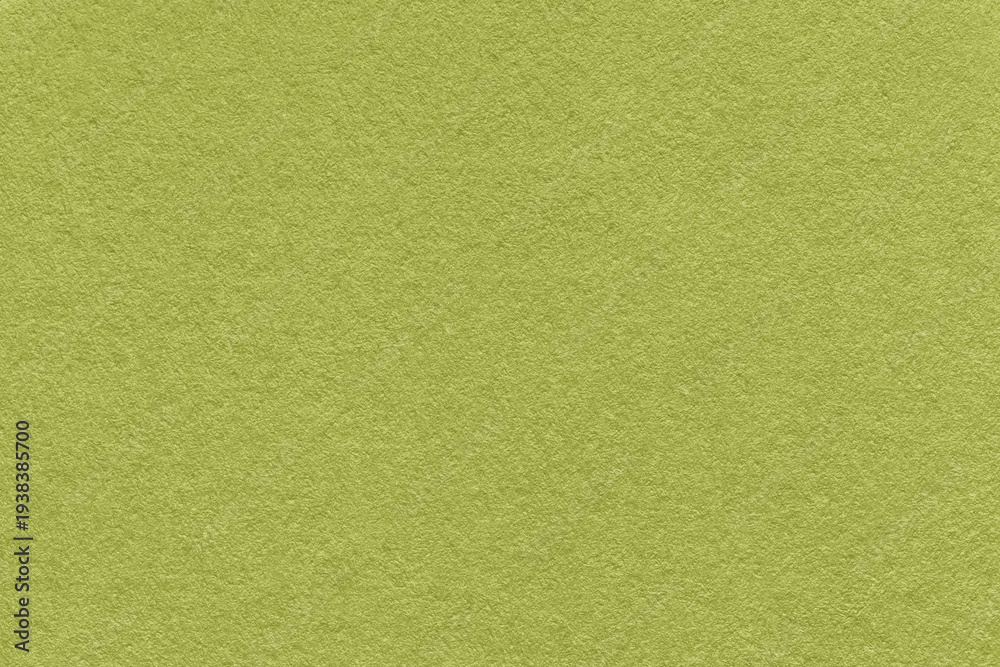 Obraz premium Olive textured paper background with subtle grain surface and soft structure. Green backdrop, macro