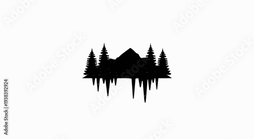 Silhouette of pine trees and mountain reflected in water