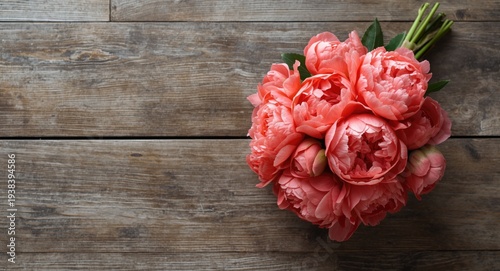 Coral peonies bouquet displ...