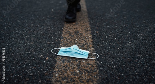 abandoned surgical mask on ...