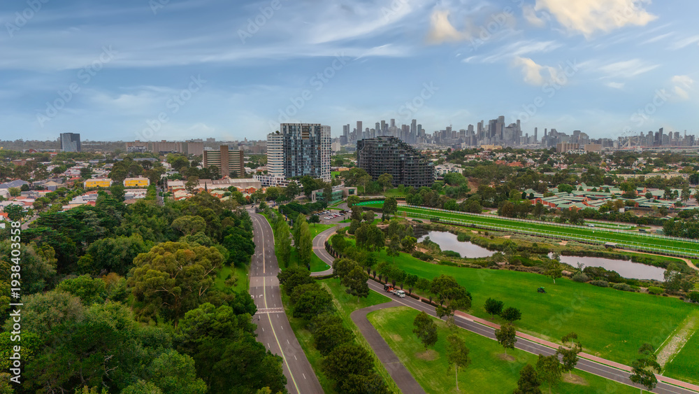 Obraz premium Panoramic Aerial Drone view of Inner Suburbs of Melbourne housing, roof tops, the streets and the parks, the roads and trees of Ascot Vale Moonee Ponds Brunswick Essendon and Maribyrnong in VIC Victor