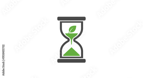 Hourglass with green sand and leaf.