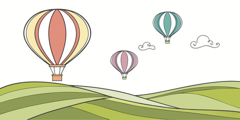 Fotobehang Luchtballon Luchtballonnen boven groen heuvellandschap  © BOY