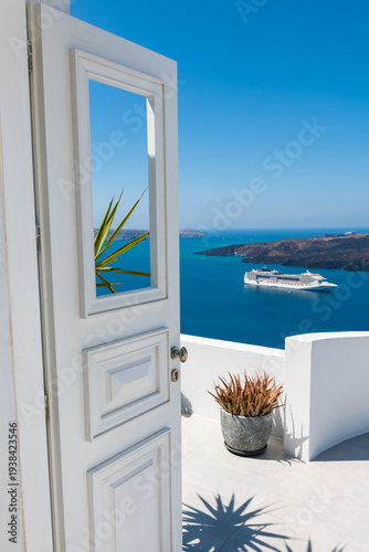 White architecture in Santorini island, Greece. Beautiful terrace with sea view.