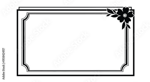 Black and white ornate frame with floral embellishment in the upper corner