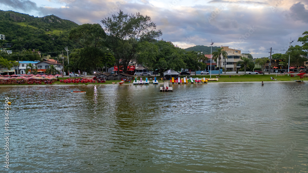 Obraz premium Aerial Waterfront Village Boats Restaurants Atlantic Forest Hills Lagoa Da Conceicao Florianopolis Brazil Island Coastal Scenery Santa Catarina South America Travel Destination