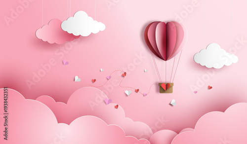 Valentine paper cut background with heart hot air balloon flying among clouds and floating hearts, cute pastel pink romantic love theme with copy space for greeting card or invitation.