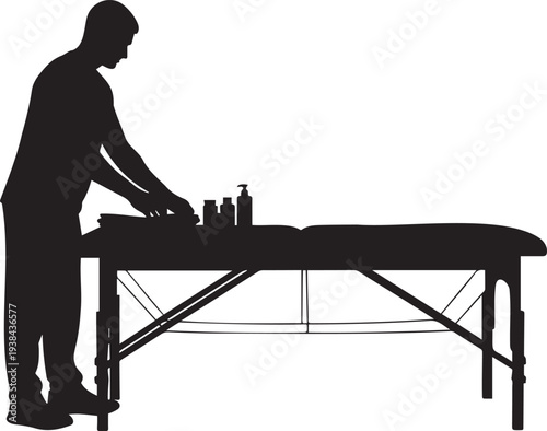 Male Therapist Preparing Massage Table Silhouette.