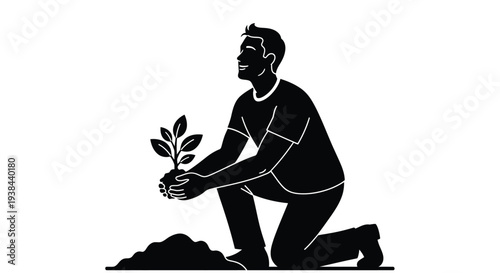 Man planting a seedling kneeling in garden soil black silhouette
